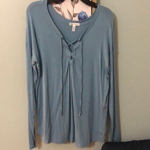 Light blue long sleeved shirt